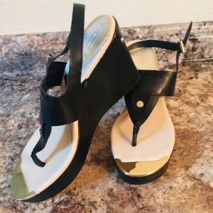 Guess black and gold wedges